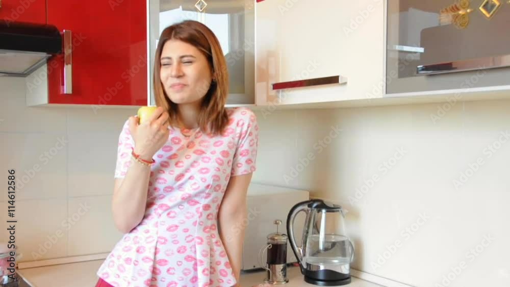 Healthy lifestyle woman eating yellow apple Healthy lifestyle woman eating yellow apple