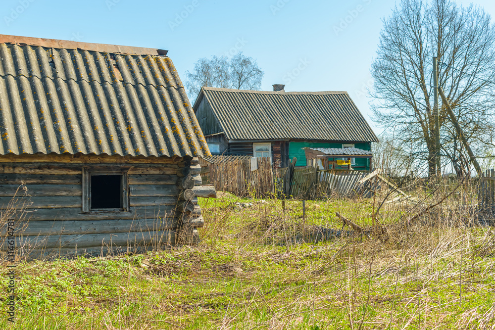 Wooden house on the banks of the Volkhov river Wooden house on the banks of the Volkhov river