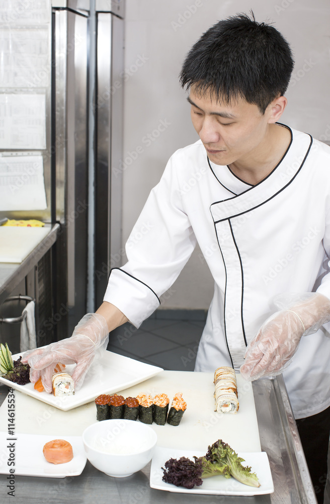 Japanese chef preparing a meal in a restaurant
