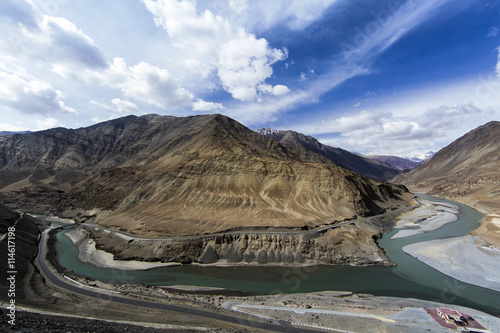 Top view of confluence of rivers Indus and Zanskar looks enticing from hill road going towards Nemo village.Leh Ladakh, India photo