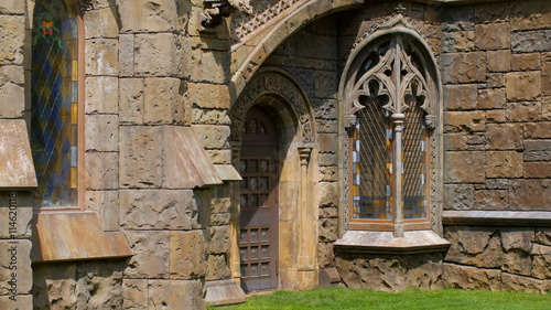 stained-glass windows and door of medieval castle