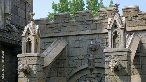 wall of medieval castle with columns  decoration  towers