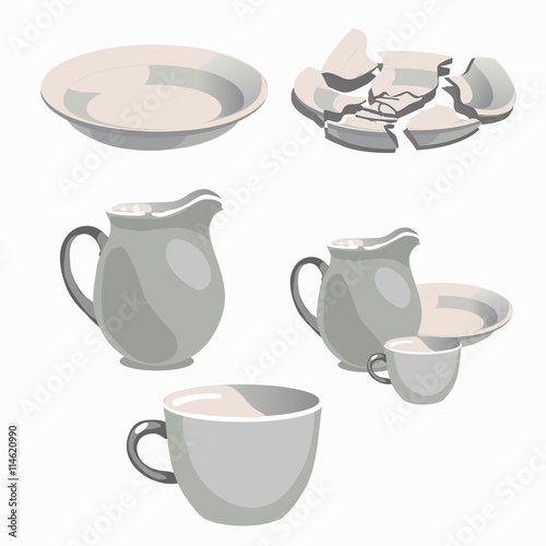 White porcelain kitchen utensils and broken plate
