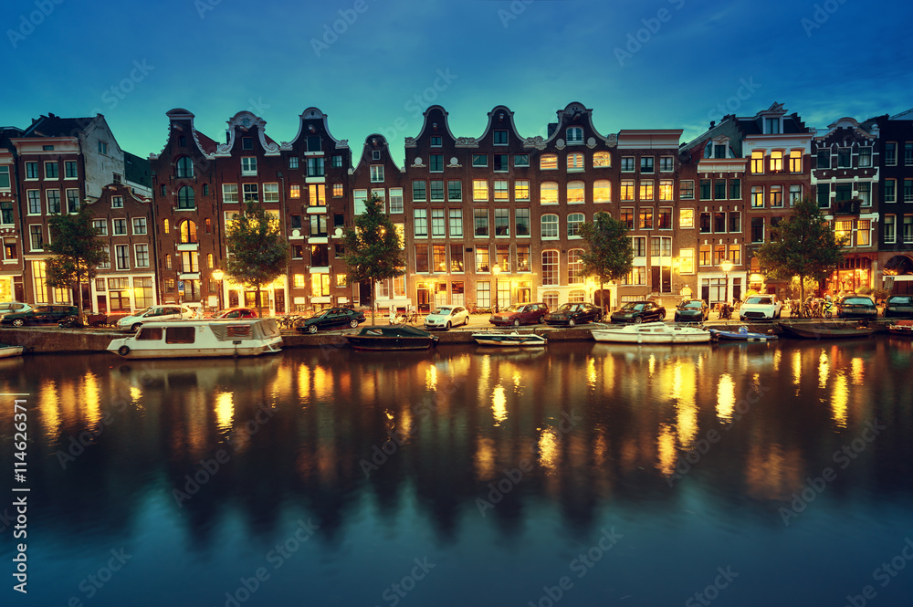 Canal in Amsterdam at night, Netherlands