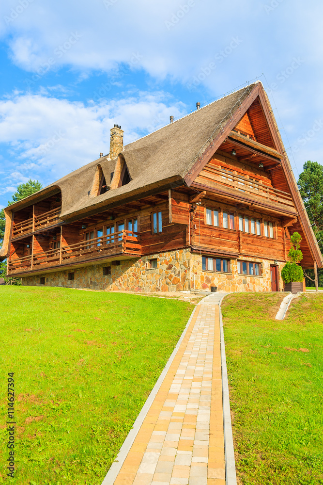Traditional mountain house in a village near Arlamow, Bieszczady Mountains, Poland Traditional mountain house in a village near Arlamow, Bieszczady Mountains, Poland