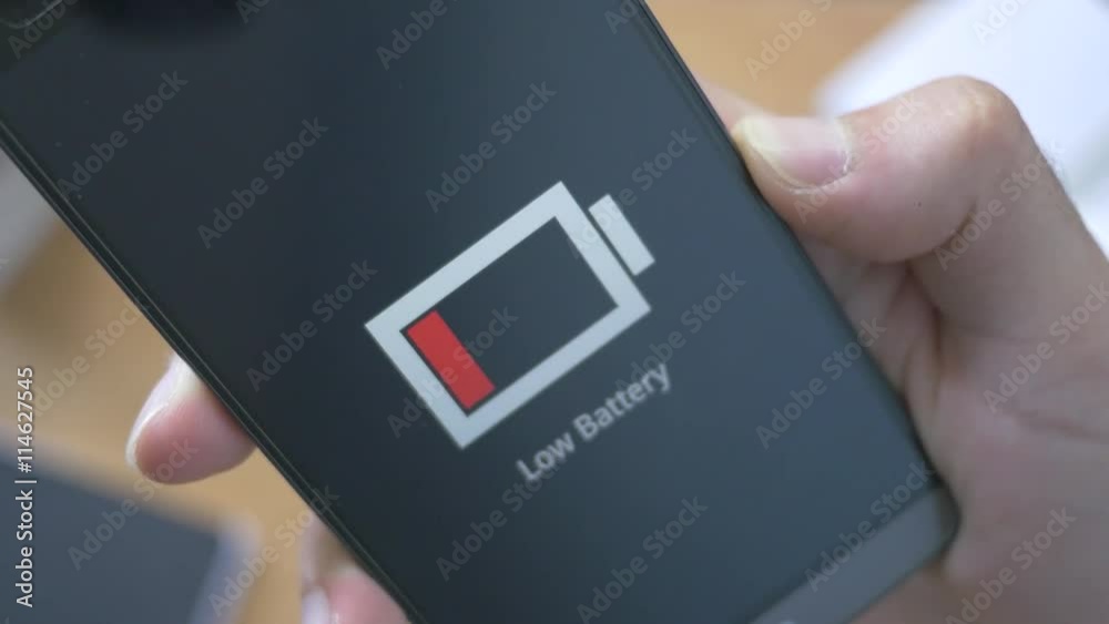Smart phone showing a notification about the low battery status