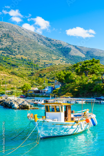 Traditional greek fishing boat in port of Zola village, Kefalonia island, Greece