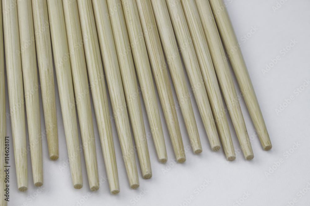 Close-up chopstick isolate, on white background. Close-up chopstick isolate, on white background.
