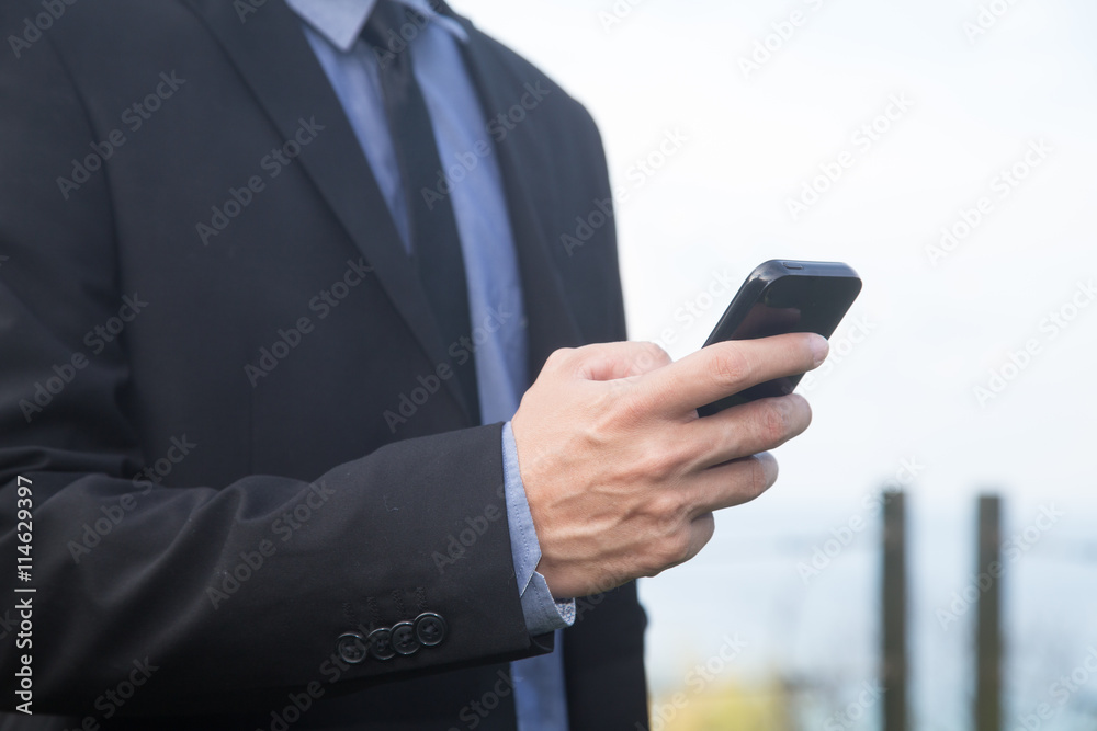 Businessman using mobile smartphone Businessman using mobile smartphone