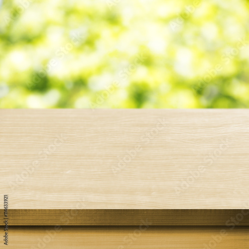 Wooden tabletop with blurred background