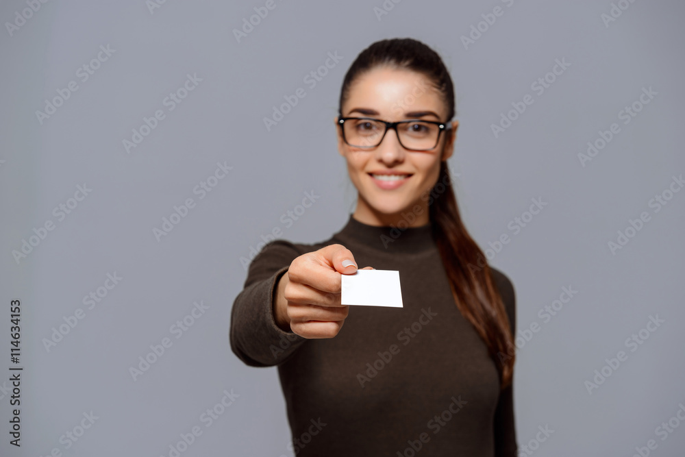 Beautiful young girl wearing glasses holding plate. Beautiful young girl wearing glasses holding plate.