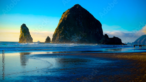 Cannon Beach sunset and famous Haystack Rock.  Oregon  USA.