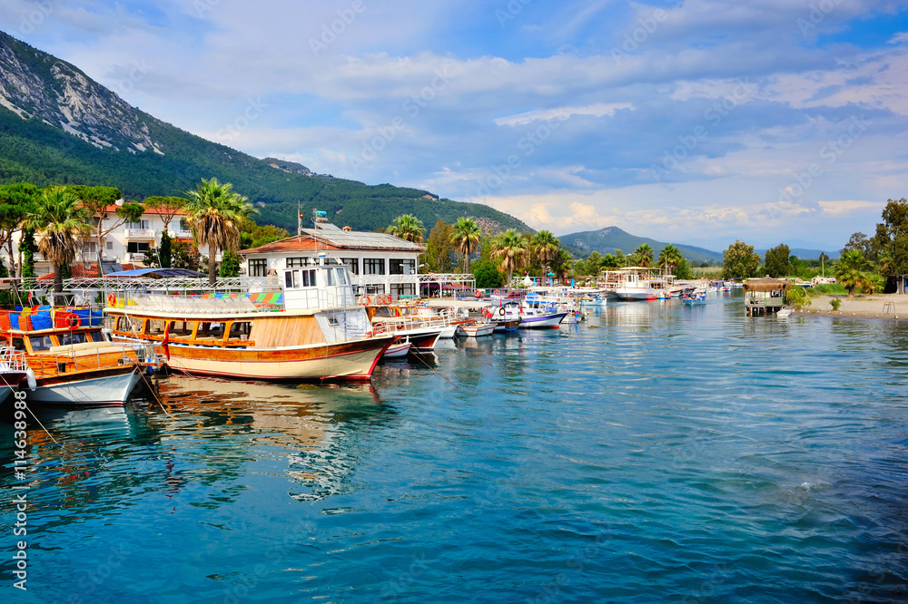Sea pier with colorful boats. Aegean sea. Turkey