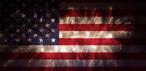 Celebratory fireworks on the background of the US flag. Independence day