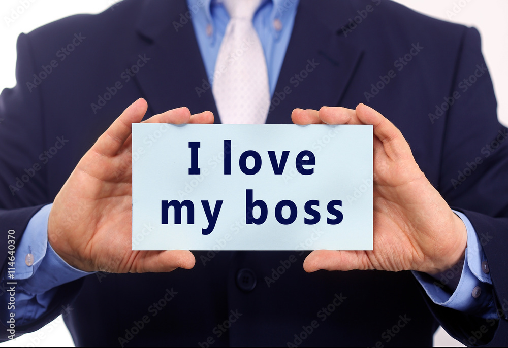 Business man hold I love my boss text on it Business man hold I love my boss text on it