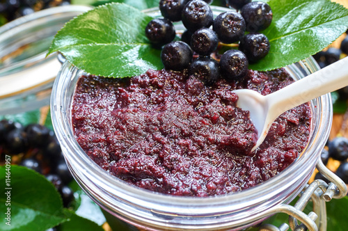 Chokeberry jam and ripe berry of chokeberry