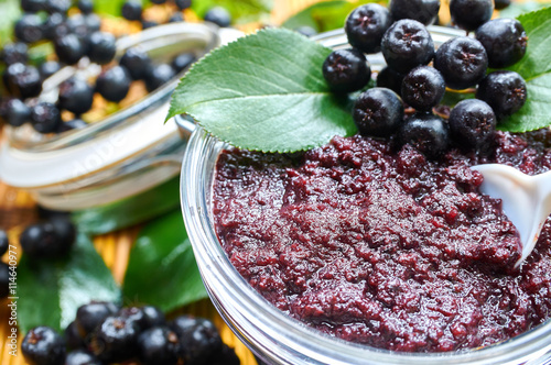 Chokeberry jam and ripe berry of chokeberry