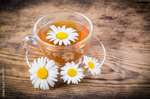 Herbal tea with chamomile flowers