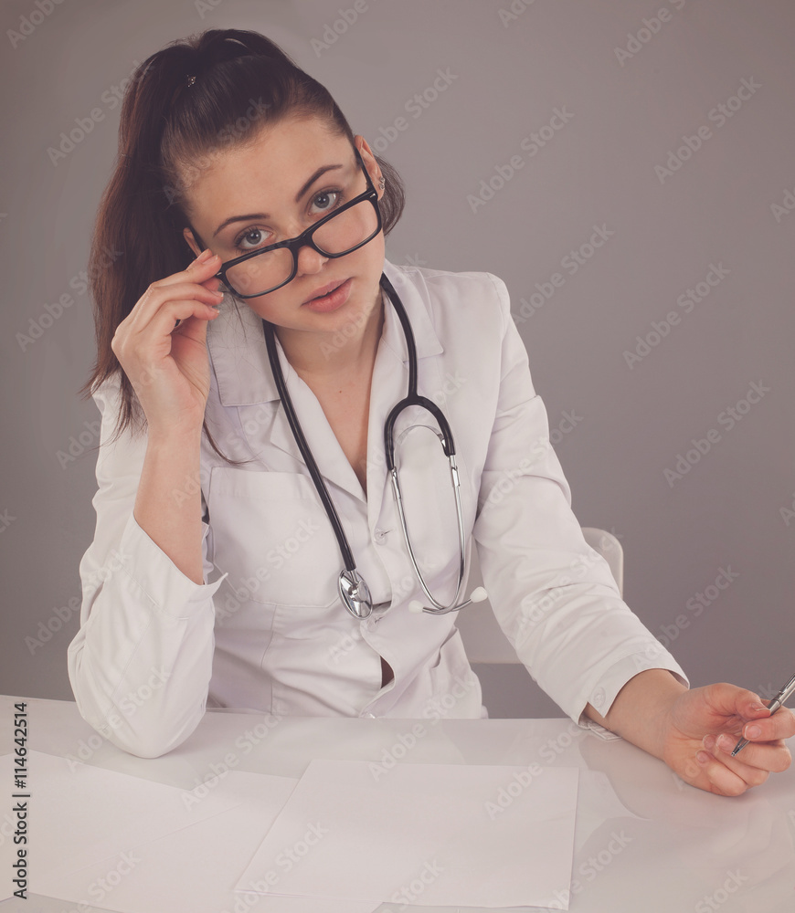 Nurse with glasses and pen