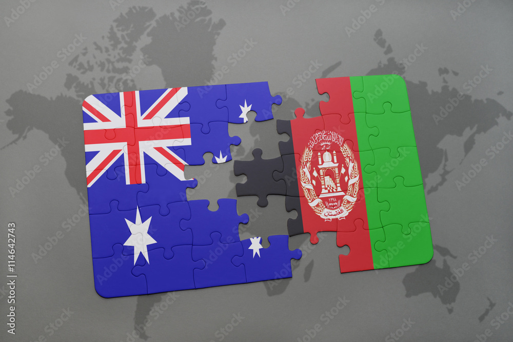 puzzle with the national flag of australia and afghanistan on a world ...