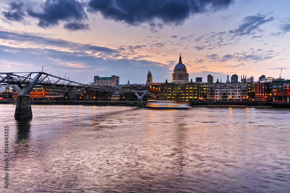 Night photo of St Paul's Cathedral and Millennium Footbridge over the Thames, London, England, Great Britain