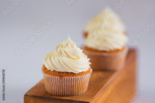 Vanilla cupcake with swiss merignue buttercream photo