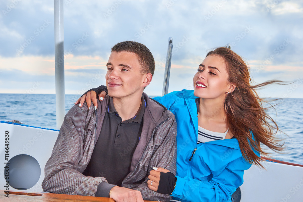Happy couple woman and man traveling on vacation travel sailing