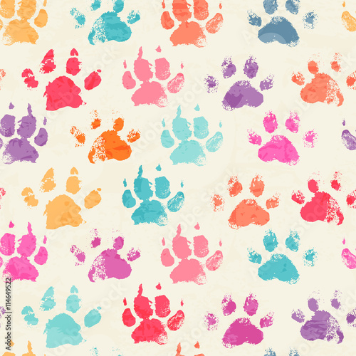 Abstract seamless pattern with bright colorful hand paw prints