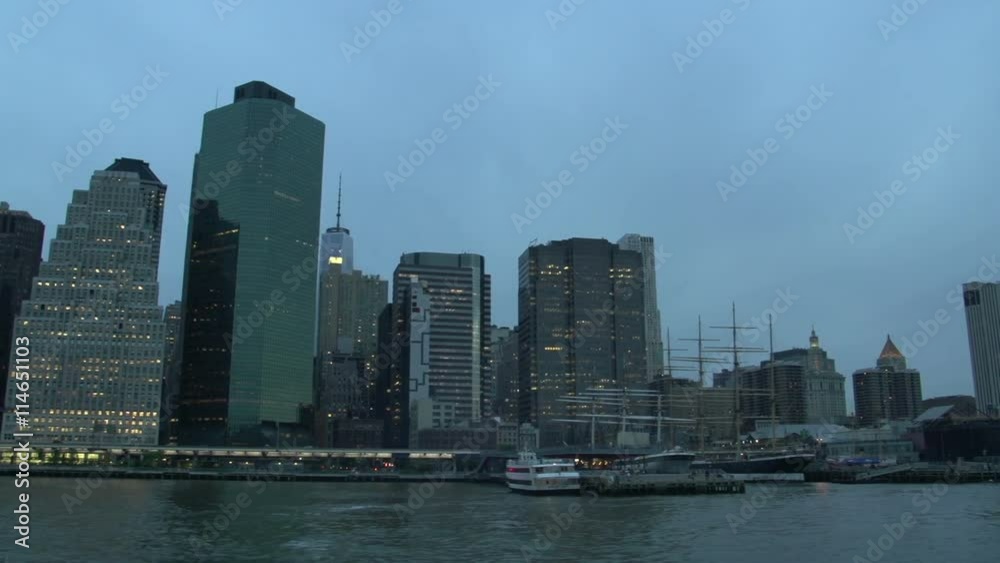 Manhattan skyline at night from the East River, New York City, USA