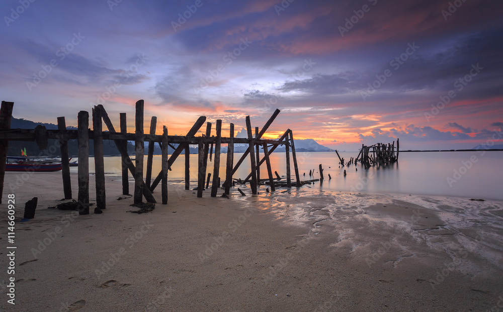 Abandon Jetty at Black Sand Beach Village in Langkawi Island, Malaysia.