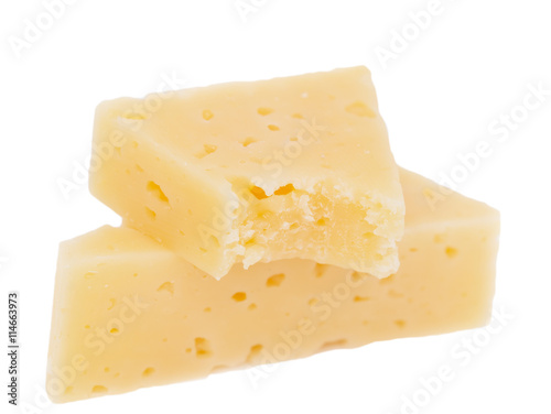 yellow solid cheese pieces on the white background