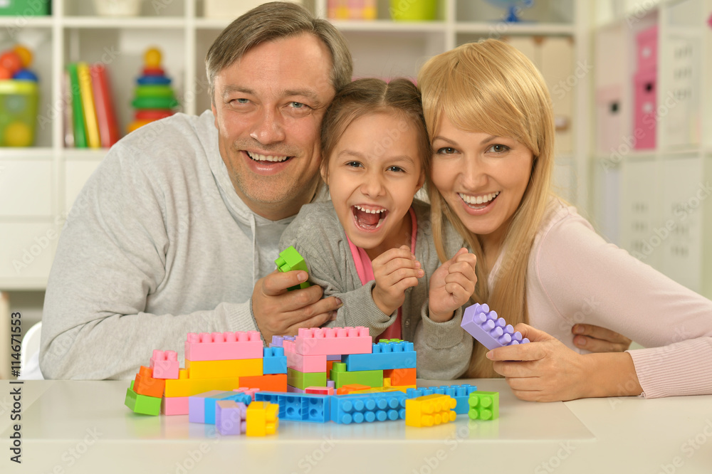 happy family playing at home happy family playing at home