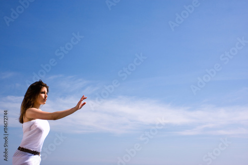 woman and blue sky