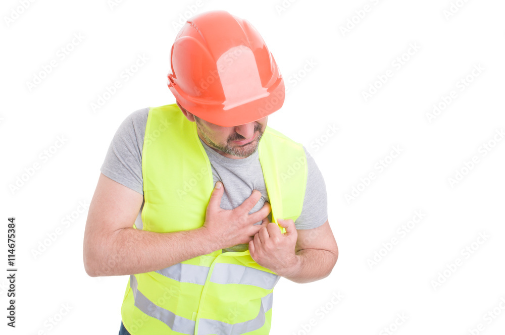 Cardiac disease concept with builder with chest pain Cardiac disease concept with builder with chest pain