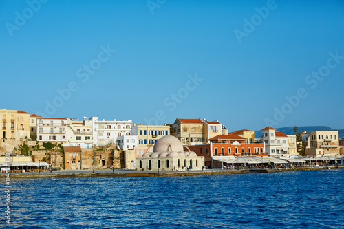 Fototapeta Naklejka Na Ścianę i Meble -  waterfront of Chania bay at sunny summer day, Crete, Greece