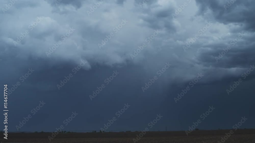 Lightning flashes from a time-lapse storm over a prairie landscape Lightning flashes from a time-lapse storm over a prairie landscape