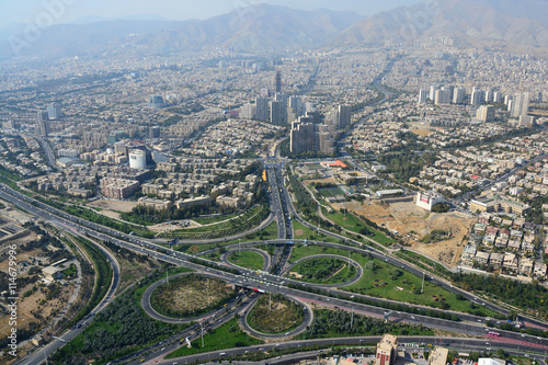 Road junction and buildings in north Tehran, Iran