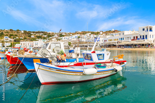 Typical colourful Greek fishing boat in Mykonos town port on island of Mykonos  Cyclades  Greece