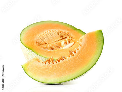 Melon cut pieces on white background.