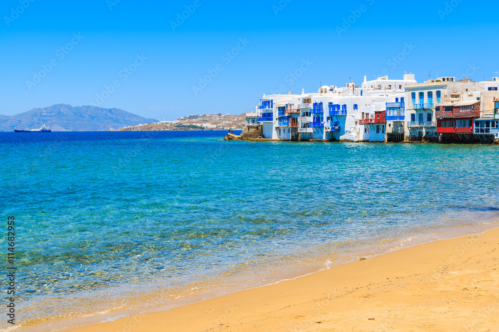 A view of beach and colorful houses in Little Venice part of Mykonos town, Mykonos island, Greece