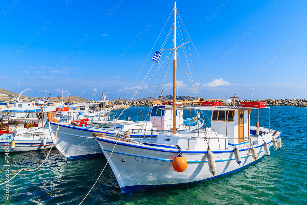 Typical Greek white fishing boats in Naoussa port, Paros island, Cyclades, Greece