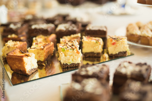 Different kinds of baked sweets on a buffet