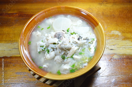 boiled rice with fish and radish hot soup on bowl