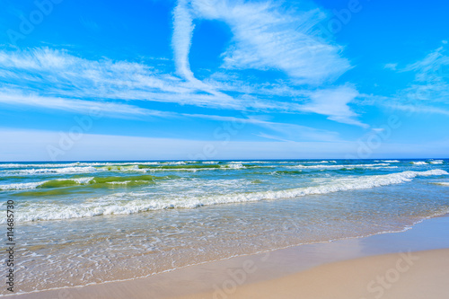 A view of beach and waves on blue Baltic Sea  Bialogora coastal village  Poland