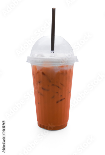 Thai tea in plastic glass and black straw isolated on white background