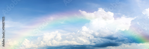 beautiful classic rainbow across in the blue sky after the rain. © rakop_ton