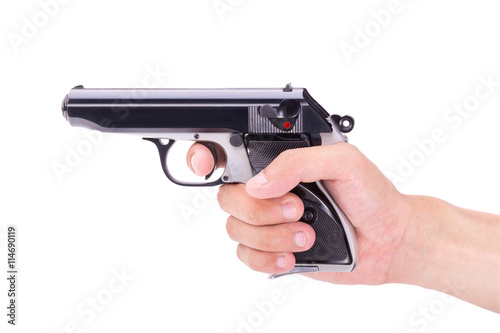White hand holds gun isolated on white background
