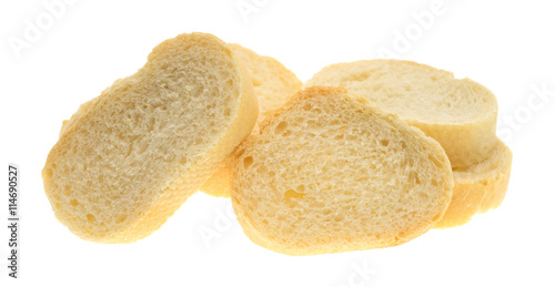 Small sliced French bread isolated on a white background side view.