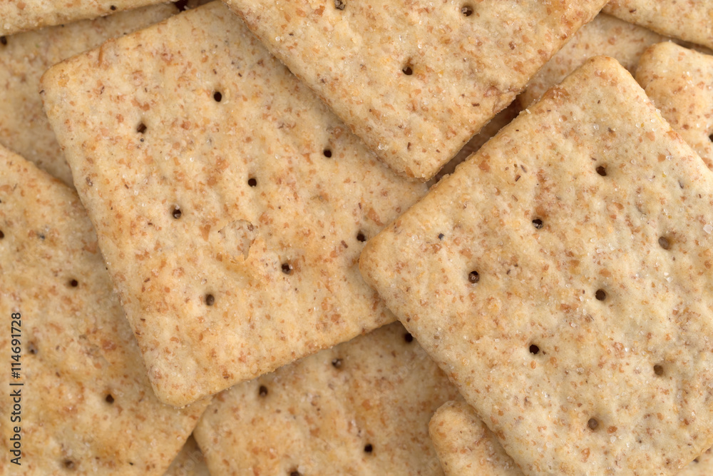 Very close view of organic whole wheat crackers. Very close view of organic whole wheat crackers.