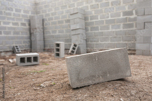 Fotografi Stack of cement blocks at the construction site